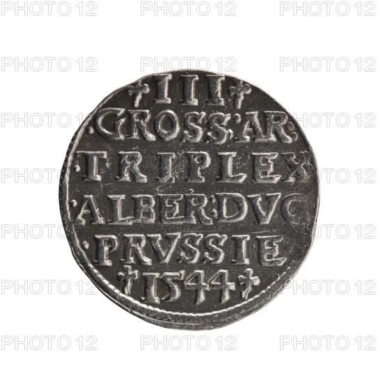 Trojak coin by Schilling, Maciej mintmaster and co-creator Decjusz, Jost Ludwik fl. 1528–1535 mint manager. Obverse: male bust in armour in profile to right; short hair, long pointed beard with sideburns; rim inscription beginning with a trefoil: -ALBER DG MAR BRAN DVX PRVS; pearl border, plant motifs between words. Reverse: six-line inscription in the pearl border: -III-/.GROSS:AR:/.TRIPLEX./.ALBER:DVC./.PRVSSIE./-I544-; denomination and date between trefoil marks. Date: 1544. Place: Ducal Prussia, Königsberg mint. Coin: diameter 21.1 mm, weight 2.62 g, axis 290°., A round coin with a metallic silver and dark gray surface, showing raised and recessed areas; the coin's edges are slightly irregular and worn, and the face displays a pattern of raised rectangular shapes and ornamental marks arranged in horizontal bands across the surface, with visible texture and small scratches.
