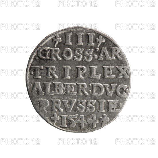 trojak; maker: Maciej Schilling mintmaster and co-creator Jost Ludwik Decjusz fl. 1528–1535, mint manager. Obverse: male bust in armour in profile to right; short hair, long beard with sideburns; rim inscription beginning with a trefoil: -ALBER D G MAR BRAN DVX PRVS; pearl border, plant motifs between words. Reverse: pearl border with six-line inscription: -III-/.GROSS:AR:/.TRIPLEX./.ALBER:DVC./.PRVSSIE./-1544-; denomination and date between trefoil marks. Date: 1544. Place: Ducal Prussia, Königsberg mint. Coin; diameter 21.0 mm; weight 2.53 g; axis 45°., A round metallic object with a worn, textured surface showing raised, carved markings and decorative elements, photographed against a plain white background; the object displays shades of silver and gray with darker gray shadows in recessed areas and subtle reflective highlights on raised portions, and its outer edge is slightly irregular with a few small dents and scratches.