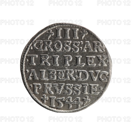 Trojak coin by Maciej Schilling mintmaster and co-creator Jost Ludwik Decjusz fl. 1528–1535; iconography: Albrecht Hohenzollern Prince of Prussia; 1490–1568 — trefoils, male busts in armour. Obverse: male bust in armour in profile turned right; short hair, long pointed beard with sideburns; rim inscription beginning with a trefoil: -ALBER DG MAR BRAN DVX PRVS; pearl border, plant motifs between words. Reverse: pearl border with six-line inscription -III-/.GROSS:AR:/.TRIPLEX./.ALBER:DVC./.PRVSSIE./-1544-; denomination and date between trefoil marks. Date: 1544. Place: Ducal Prussia 1525–1701, Königsberg mint. Coin; diameter 21.3 mm, weight 2.58 g, axis 220°., A round metallic coin with a worn, textured surface shown against a white background; the coin is primarily silver-gray with darker gray shading in recessed areas and slight highlights on raised edges, and it displays a series of raised, rectangular and rounded shapes forming horizontal bands across its face, as well as small decor...