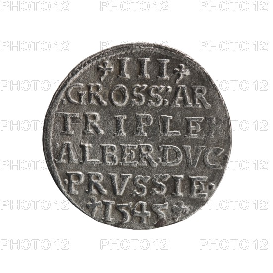 Trojak coin by Schilling, Maciej; co-creator Decjusz, Jost Ludwik fl. 1528–1535. Obverse: male bust in armour in profile to right; short hair, long pointed beard with sideburns; rim inscription beginning with a trefoil: -ALBER DG MAR BRAN DVX PRVSS with pearl border and plant motifs between words. Reverse: inscription in six lines in the pearl border: -III-/.GROSS:AR:/.TRIPLEX./.ALBER:DVC./.PRVSSIE./-I545- with denomination and date between trefoil marks. Iconography includes Albrecht Hohenzollern Prince of Prussia; 1490–1568, trefoils, male busts in armour. 1545; Ducal Prussia. Minted in Königsberg. Coin; diameter 21.2 mm; weight 2.47 g; axis 315°., A round metallic object with a worn, textured surface, showing raised and recessed areas that form patterns; the object has a silver-gray color with darker gray shadows and lighter highlights, and slight tarnish giving subtle brownish and black tones; the edge is uneven and the surface shows indentations and scratches; the background is pl...