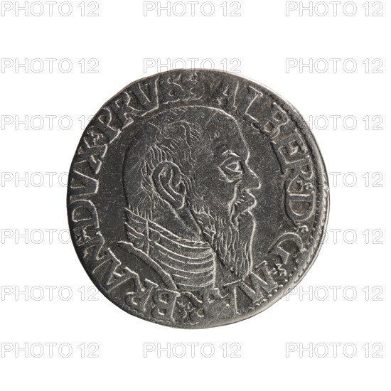 trojak, Schilling, Maciej mintmaster publisher, Decjusz, Jost Ludwik fl. 1528-1535 mint manager co-creator. Albrecht Hohenzollern Prince of Prussia; 1490-1568 - iconography: trefoils, male busts in armour. Obv.: Male bust in armour in profile turned to the right; short hair, long pointed beard with sideburns. In the rim an inscription beginning with a trefoil: -ALBER DG MAR BRAN DVX PRVSS; pearl border, plant motifs between the words. Rev.: In the pearl border an inscription in six lines: -III-/.GROSS:AR:/.TRIPLEX./.ALBER:DVC./.PRVSSIE./-I545- The denomination and date are between the trefoil marks. 1545. Ducal Prussia 1525-1701, Königsberg mint. Coin; diameter 21.0 mm; weight 2.51 g; axis 135°., A round metallic coin with a worn surface showing a raised profile of a bearded man's head facing right, surrounded by a raised border and rim; the coin's surface shows fine scratches and textured wear. The visible colors are silver and gray with darker gray shadows and slight highlights.