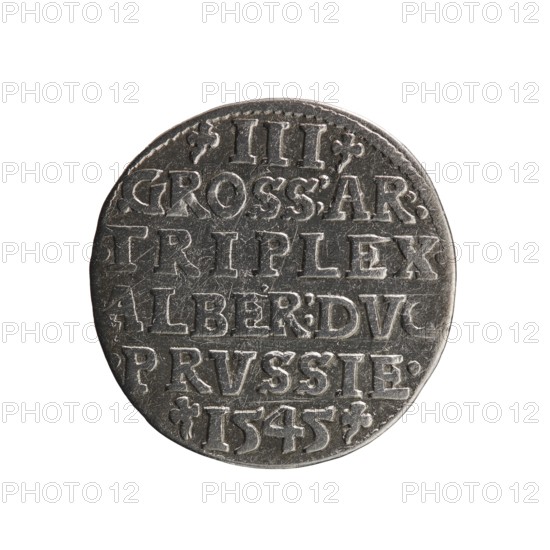 Trojak, Schilling, Maciej mintmaster; Decjusz, Jost Ludwik fl. 1528–1535 co-creator, mint manager. Obverse: male bust in armour in profile to right; short hair, long pointed beard with sideburns; rim inscription beginning with a trefoil: -ALBER DG MAR BRAN DVX PRVSS, pearl border, plant motifs between words. Reverse: pearl border with six-line inscription: -III-/.GROSS:AR:/.TRIPLEX./.ALBER:DVC./.PRVSSIE./-I545-; denomination and date between trefoil marks. 1545. Ducal Prussia 1525–1701, Königsberg mint. Coin; diameter 21.0 mm, weight 2.51 g, axis 135°.