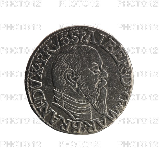 Trojak, Schilling, Maciej mintmaster; co-creator. Obverse: male bust in armour in profile facing right; short hair, long pointed beard with sideburns; rim inscription beginning with a trefoil -ALBER DG MAR BRAN DVX PRVSS; pearl border and plant motifs between words. Reverse: pearl border with six-line inscription -III-/.GROSS:AR:/.TRIPLEX./.ALBER:DVC./.PRVSSIE./-I546-; denomination and date between trefoil marks. 1546. Ducal Prussia 1525–1701, Königsberg. Coin; diameter 21.1 mm; weight 2.10 g; axis 170°., A round metallic object with a worn silver-gray surface featuring a raised profile of a bearded man facing right; the portrait shows detailed hair, ear, and facial features and a high-collared garment with layered textures. The object has a slightly irregular rim with raised decorative edging and a ring of raised areas around the portrait. Overall colors visible are silver-gray with darker gray shadows and lighter silvery highlights.