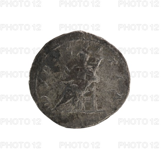 Denarius, Elagabalus 204–222; Roman emperor 218–222. Obv.: IVLIAMAESAAVG — Draped bust of Julia Maesa facing right, pearl border. Rev.: PVDIC ITIA — Veiled Pudicitia sits on a throne facing left, raising the hem of her veil with her right hand, holding a scepter in her left, pearl border. 218–223, Rome; Roman Empire 27 BC–476. Coin; diameter 17.5–18.0 mm, weight 2.87 g., A single round object resembling a worn coin with an uneven edge sits against a white background; the surface shows a textured, weathered appearance with a raised indistinct design in relief that includes a profile of a human-like figure and another standing figure, with areas of smoothing and scratches; the colors visible are dark gray, lighter gray highlights, and hints of brownish-gray in places.
