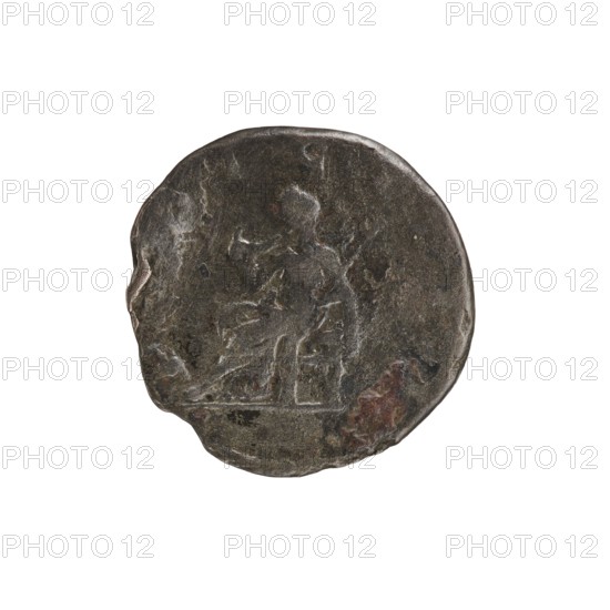 denarius, Elagabalus 204–222; Roman emperor 218–222. Obv.: IVLIA MAESA AVG — Draped bust of Julia Maesa facing right, pearl border. Rev.: PVDIC ITIA — Veiled Pudicitia seated on a throne facing left, raising the hem of her veil with her right hand and holding a scepter in her left, pearl border. 218–223, Rome; coin, dia. 16.5–17.0 mm, weight 2.30 g., A round, worn coin with an uneven edge showing a raised, faintly detailed relief of a standing human figure; the surface has a dark, aged patina with areas of lighter wear and a few reddish-brown spots, and the background around the coin is white.