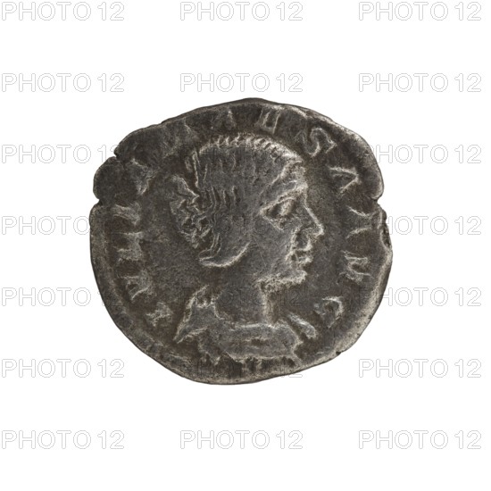 Denarius, Elagabalus 204–222; Roman emperor 218–222. Obverse: IVLIA MAESA AVG — Draped bust of Julia Maesa facing right, pearl rim. Reverse: SAECVLI FELICITAS — Felicitas standing left, holding a patera above a burning altar in her right hand and a long caduceus in her left; star in right field, pearl rim. Date: 218–223. Place of origin: Rome. Coin; diameter 17.0–18.0 mm; weight 2.60 g., A worn round coin with a dark gray, metallic surface showing a raised profile of a person facing right; the figure has short textured hair and a visible ear and neck, with the raised portrait and surrounding rim appearing lighter gray against darker recessed areas, and the coin edge is irregular and slightly rough.