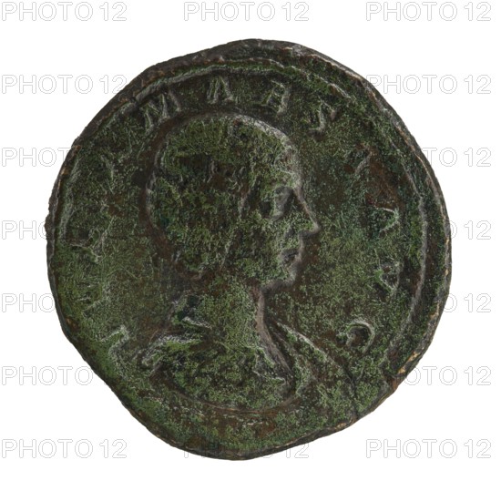 Sestertius, Elagabalus Roman emperor 218–222. Obverse: Draped bust of Julia Maesa facing right, pearl border; legend IVLIAMAESAAVG. Reverse: Felicitas stands facing left, holding a patera above a burning altar in her right hand and a long caduceus in her left; star in right field, letters SC on either side of altar; pearl border; legend SAECVLI FELICITAS or SAECVLIFE LICITAS. Date: 218–223. Roman coin struck in Rome. Bronze; diameter ~32–33 mm, weight 23.50 g., A round, weathered coin with a raised profile of a person facing right, showing the head, neck, and part of the shoulder; the surface is rough and mottled with visible patches of green and dark brown patina, with lighter green speckling across the relief and rim; the coin edge is uneven and worn, and the background around the profile shares the same textured green and brown coloration.