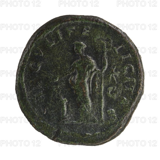 Sestertius of Elagabalus reigned 218–222. Obverse: Draped bust of Julia Maesa facing right, pearl border, inscription IVLIAMAESAAVG. Reverse: Felicitas stands facing left, holding a patera above a burning altar in her right hand and a long caduceus in her left; star in right field, letters SC at sides, pearl border, legend SAECVLIFE LICITAS. Roman Empire, struck Rome, circa 218–223. Bronze coin, diameter ~32–33 mm, weight 23.50 g., A worn circular coin with an irregular edge showing a raised central figure standing and holding an object, the surface textured with patches of green and dark brown patina, with lighter grayish highlights on the raised areas.