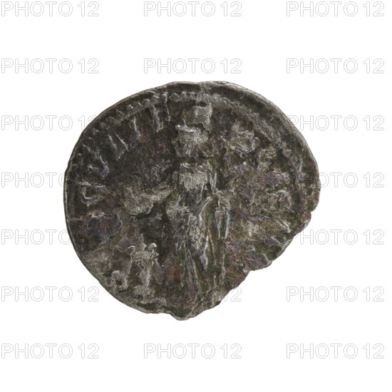 Denarius of Elagabalus reigned 218–222. Obverse: Draped bust of Julia Maesa facing right, pearl rim; inscription IVLIAMAESAAVG. Reverse: Felicitas standing left, holding a patera over a burning altar in her right hand and a long caduceus in her left; pearl rim; inscription SAECVLIFE LICITAS. Roman Imperial coin, struck Rome, 218–223. Diameter c. 17–19 mm; weight 2.12 g., A worn circular metallic object with an irregular edge showing areas of damage and a slightly rough, pitted surface; the object has a mix of dark gray, silvery gray, brownish, greenish, and faint reddish tones, with patches of lighter metallic highlights where raised details remain; faint raised shapes suggest a standing figure or vertical form in the center and suggestive curved elements near the perimeter, all set against a plain white background.