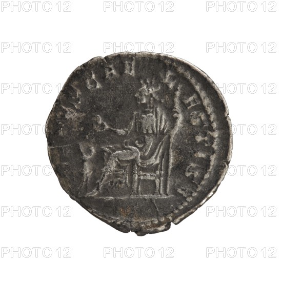 Denarius, Elagabalus reigned 218–222 CE; issuer: Julia Soaemias 180–222. Obverse: Draped bust of Julia Soaemias facing right, pearl border, inscription IVLIASOAEMIASAVG. Reverse: VENVSCAE L ESTIS — Venus seated on a throne facing left, holding an apple in right hand and a scepter in left; at her feet a child with outstretched arms, pearl border. Roman Empire, struck in Rome, 218–222 CE. Coin: diameter 19.0 mm, weight 3.20 g., A circular dark gray coin with worn edges showing a raised design of a seated figure facing right; the figure appears draped and sits on a chair with a high back, one arm extended and the other resting, with a smaller indistinct object near the figure's feet; the coin surface shows lighter gray highlights and areas of wear, with irregular rim texture and small chips, and the overall colors visible are dark gray and lighter gray.