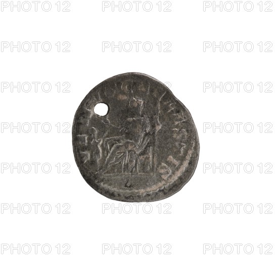 Denarius with a hole, Elagabalus 204–222; Roman emperor 218–222, issuer: Julia Soaemias 180–222; Augusta 218–222. Obverse: IVLIASOAEMIASAVG — Draped bust of Julia Soaemias facing right, pearl border. Reverse: VENVSCAELESTIS — Venus seated on a throne facing left, holding an apple in her right hand and a scepter in her left; at her feet a child stands with outstretched arms, pearl border. Date: 218–222. Place of origin: Rome, Roman Empire. Object type: coin. Diameter: 18.5–19.0 mm. Weight: 1.90 g., A round, dark gray coin with a rough, weathered surface and a small circular hole near its edge, showing worn raised designs and faint outlines that suggest figures and decorative edges; visible colors include shades of dark gray, lighter gray highlights, and subtle brownish tones.