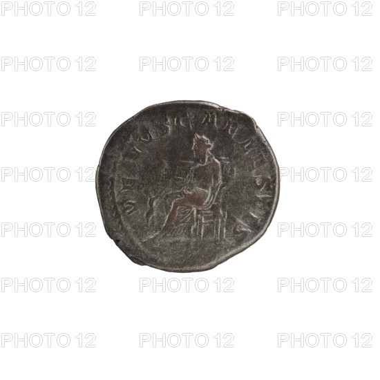 Denarius, Elagabalus reigned 218–222. Obverse: Draped bust of Julia Soaemias facing right, IVLIA SOAEMIAS AVG, pearl border. Reverse: VENVS CAELESTIS; Venus seated on a throne facing left, holding an apple in her right hand and a scepter in her left; at her feet a child with outstretched arms, pearl border. Roman Empire, Rome; 218–222 CE. Coin, diameter ~18–19 mm, weight 3.80 g., A circular metallic coin with a worn, dark gray surface and hints of brownish patina, showing an engraved seated figure facing right on a simple chair; the figure appears draped in cloth with visible folds, and there are several raised decorative marks around the coin's edge.