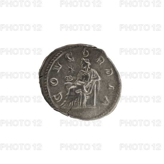 Denarius, Elagabalus Roman emperor 218–222 issuer, Julia Paula ca. 190–235; Roman empress 219–220. Obv.: IVLIAPAVLAAVG — Draped bust of Julia Paula facing right, pearl border. Rev.: CONCORDIA — Concordia seated left, holding a patera in her right hand, resting the elbow of her left hand on the back of the throne; in the left field a star, pearl border. Date: 219–220. Place of origin: Rome, Roman Empire. Coin; diameter 16.5–19.0 mm; weight 3.20 g., A round metal coin with a worn dark gray surface showing a seated figure in relief at its center, the figure appears robed and holding an object in one hand while seated on a stylized throne; the coin edge is irregular with a visible crack and a slightly raised border, and the surface shows areas of lighter gray along raised details and darker gray in recessed areas.