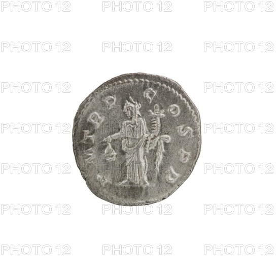 Denarius of Alexander Severus Roman emperor, 222–235. Obverse: Bust of Alexander Severus with laurel wreath and paludamentum facing right; pearl rim; inscription IMPCMAVRSEVALEXANDAVG. Reverse: Libertas stands straight with head to the left, holding a pileus in his right hand and a cornucopia in his left; pearl rim; inscription PMTR P C OSPP. Roman Empire, 222. Coin; diameter ~18.5–19.0 mm; weight 3.60 g., A circular metallic object with a worn gray surface showing a raised central design of a standing human figure draped in robes holding a small object in one hand, beside a taller vertical element with decorative details; the rim has a patterned border and the overall color is various shades of gray with lighter highlights on the raised areas.