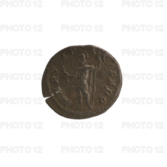 Denarius of Alexander Severus reigned 222–235. Obverse: Bust of Alexander Severus in laurel wreath, armor and paludamentum, facing right; legend IMPCMAVRSEVALEXANDAVG; pearl border. Reverse: Mars in military dress and helmet standing left, holding a branch in his right hand and leaning his left against a standing spear; legend MARTI PACIFERO; pearl border. Roman Empire, struck 222–228, Rome. Coin; diameter ca. 18.0–19.5 mm; weight 3.82 g., A round, worn coin with a dark brown and greenish patina, showing a raised central figure in relief and faint surrounding raised rim details; the coin's surface has irregular texture and a visible crack near one edge, and the overall color palette includes shades of brown, dark green, and hints of gray.