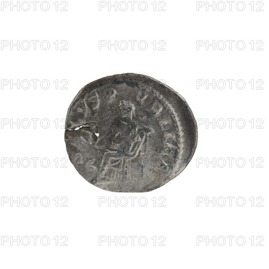 Denarius, personifications, Alexander Severus Roman emperor; 222–235 — iconography: Salus personification. Obverse: IMPCMAVRSEVALEXANDAVG — Bust of Alexander Severus with laurel wreath and paludamentum facing right, pearl rim. Reverse: SALVSPVBLICA — Salus seated facing left; in her right hand she holds a patera from which she feeds a snake coiled around the altar, her left hand rests on the backrest, pearl rim. 222–228, Roman Empire; Rome. Coin: diameter 17.5–20.0 mm, weight 2.38 g., A worn round metallic object with a rough, pitted surface and an uneven edge, showing a visible crack and a small missing chunk, displaying a faint raised profile of a person and an adjacent raised figure or symbol; colors visible include shades of gray, dark gray, and hints of bluish-green on a white background.