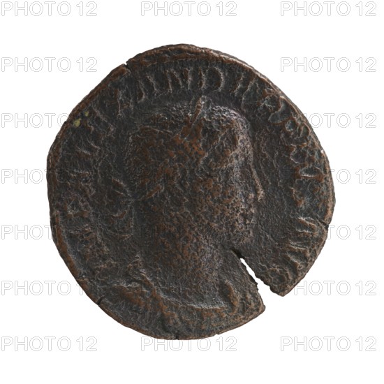 Sestertius, Alexander Severus 208–235; Roman emperor 222–235. Obverse: Bust of Alexander Severus in laurel wreath, armor and paludamentum facing right; inscription IMPCMAVRSEVALEXANDAVG. Reverse: SALVS PVBLICA, in exergue SC. Salus sits facing left; in his right hand he holds a patera from which he feeds a snake wrapped around the altar, his left hand rests on the backrest. Pearl borders. 231–235 CE. Rome. Coin; diameter ~29–30 mm; weight 14.86 g., A worn round coin with an irregular edge and a missing chunk showing rough texture and pitting across its surface; the coin displays the faint profile of a person's head in low relief at the center, with subtle contour lines suggesting hair and facial shape; the surface shows mottled colors including dark brown, black, and hints of lighter brown and greenish patina; overall the coin appears aged with uneven shading and areas of smoother wear contrasting with rough corroded patches.