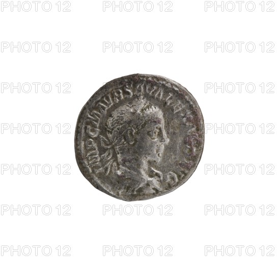Denarius, Roman deities; Jupiter; Alexander Severus Roman emperor, r. 222–235 — iconography. Obverse: IMPCMAVRSEVALEXANDAVG. Bust of Alexander Severus with laurel wreath and paludamentum facing right; pearl rim. Reverse: PM TRPII COSPP. Jupiter naked in a cloak stands facing left, holding a thunderbolt in his right hand and a long scepter in his left; pearl rim. Date: 223. Origin: Rome, Roman Empire 27 BC–476. Coin; diameter 17.5–19.0 mm; weight 1.80 g., A round metallic coin with a worn surface showing a raised profile of a person facing right, surrounded by a raised border and a ring of embossed markings around the edge; the coin displays shades of gray and silver with areas of darker patina and hints of brownish and greenish discoloration.