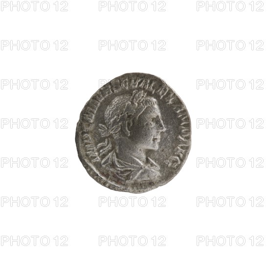 Denarius, personifications, Alexander Severus Roman emperor; 222–235 — iconography: Salus. Obverse: IMPCMAVRSEVALEXANDAVG. Bust of Alexander Severus with laurel wreath and paludamentum facing right; pearl rim. Reverse: PMTRPII COSPP. Salus sits on a throne facing left; in her right hand she holds a patera from which she feeds a snake coiled around the altar, her left elbow rests on the back of the throne; pearl rim. 222, Rome; Roman Empire 27 BC–476. Coin; diameter 17.0–18.0 mm; weight 2.68 g., A round metallic coin with a worn surface showing a raised profile of a person facing right, with textured hair and a draped garment; the coin appears in shades of gray and silver with some darker gray areas and slight brownish discoloration along parts of the edge.