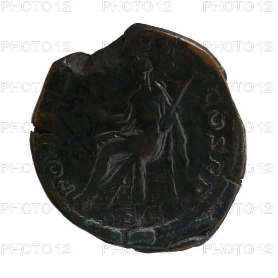 Sestertius, Roman deities, Alexander Severus Roman emperor; 222–235 — iconography: Pax personification. Obverse: Bust of Alexander Severus in laurel wreath, armor and paludamentum facing right; pearl border; inscription IMPCAESMAVRSEVALEXANDERAVG. Reverse: Pax seated on a throne facing left, olive branch in right hand, scepter in left hand; pearl border; inscription PONTIFMAXTRPI ICOSPP and in exergue SC. Date: 223. Roman Empire 27 BC–476, Rome. Coin sestertius; diameter ~31.0–31.5 mm; weight 23.50 g., A circular, worn coin with an irregular edge showing a seated human figure in relief at the center, the figure facing slightly to the right and holding a long staff or spear; the surface shows raised and recessed sculpted details and areas of wear and corrosion. The coin displays dark brown and black tones overall with patches of green and hints of lighter brown where the metal is exposed. The background around the coin is white.