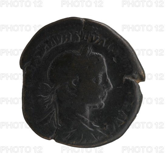 Sestertius, personifications, Alexander Severus Roman Emperor; 222–235 — iconography: Providentia. Obverse: IMPCAESMAVRSEVALEXANDERAVG. Bust of Alexander Severus wearing a laurel wreath, armor and paludamentum facing right, pearl rim. Reverse: PONTIFMAXTRPIICOSPP. Providentia stands upright, head turned left, holding a baton in her right hand and, with her left hand leaning on a column, a cornucopia; a sphere at her feet left; SC on the sides; pearl rim. 223. Roman Empire 27 BC–476, Rome. Coin; diameter 29.0–31.0 mm; weight 17.01 g., A dark round coin with a worn surface showing the profile of a person's head facing right; the head has short hair and a tied ribbon at the back, and there are visible contours of the neck and shoulders. The coin is mostly black with areas of dark brown patina along the edges and on raised surfaces, and the rim is irregular with a small chip on one side. The background around the coin is plain white.