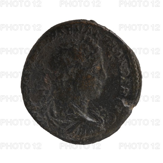 Sestertius; obverse: bust of Alexander Severus Roman Emperor, 222–235 in laurel wreath, armor and paludamentum facing right, pearl border, legend IMPCAESMAVRSEVALEXANDERAVG. Reverse: PONTIFMAXTRPIICOSPP; in exergue SC. Securitas seated left, holding a sceptre in his right hand and supporting her head with her left, left elbow resting on the back of the throne; burning altar at left, pearl border. Date: 223. Roman Empire 27 BC–476, minted in Rome. Coin; diameter ~29.5–30.0 mm; weight 23.20 g., A round, worn object with a rough, uneven surface in dark brown and black tones with hints of rusty orange and lighter gray areas, showing the faint, raised impression of a human profile facing right and a textured rim around part of the edge, photographed against a white background.