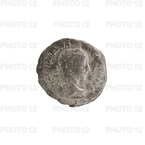 Denarius of Alexander Severus reigned 222–235. Obverse: Bust of Alexander Severus right, wearing laurel wreath and paludamentum; inscription IMPCMAVRSEVALEXANDAVG. Reverse: Mars in military dress and helmet standing turned left, holding a branch in his right hand and resting his left on a spear; inscription PMTRP III COSPP. Pearl rim. Dated 224. Roman Empire; minted in Rome. Coin, diameter ~18.5–19.5 mm, weight 2.63 g., A worn round metal coin with uneven edges showing the profile of a human head facing right; the surface is textured and shows areas of wear and shallow raised details; the coin appears in shades of gray and dull silver with darker gray patina in crevices and lighter silver highlights on raised areas.
