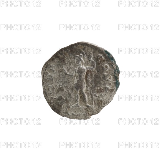 Denarius of Alexander Severus reigned 222–235 CE. Obverse: Bust of Alexander Severus right, wearing a laurel wreath and paludamentum; inscription IMPCMAVRSEVALEXANDAVG. Reverse: Mars in military dress and helmet, standing turned left, holding a branch in his right hand and resting his left on a spear; inscription PMTRP III COSPP. Pearl rim. Dated 224. Roman Empire; Rome mint. Coin, diameter 18.5–19.5 mm, weight 2.63 g., A worn round metallic object with an uneven surface and irregular edges, showing a mix of gray, dark gray, brownish tones and small areas of greenish-blue patina, with faint raised and recessed textures suggesting an indistinct central vertical shape and scattered irregular marks across the face.
