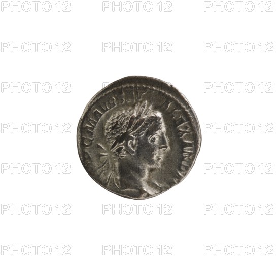 Denarius; Roman; Alexander Severus emperor, 222–235. Obverse: Bust of Alexander Severus right, laurel wreath and paludamentum; legend IMPCMAVRSEVALEXANDAVG. Reverse: Jupiter half-naked seated on throne facing left, holding Victoria in his outstretched right hand and a spear in his left; legend IOVI VL TORI. Pearl rim. Date: 222–228. Material: coin. Diameter: 17.0–18.0 mm. Weight: 2.90 g., A circular metallic coin with a weathered surface showing a raised profile of a person's head facing right, wearing a laurel or wreath-like headpiece; the coin's rim is slightly irregular and the surface has areas of darker and lighter metallic gray tones with a subtle reflective sheen.
