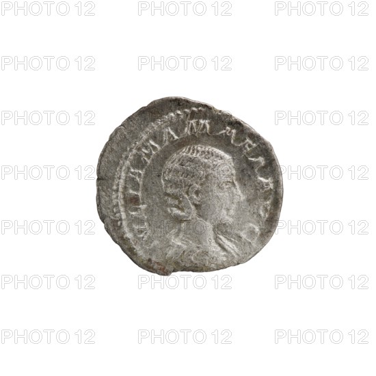 Denarius; obverse: Julia Mamaea ca. 180–235; Augusta 222–235, issuer: Alexander Severus 208–235; Roman emperor 222–235; reverse: Juno Roman deity; iconography: Julia Mamaea 180–235; date: 225–235; place: Roman Empire 27 BC–476, Rome mint; coin; diameter 19.0–20.0 mm; weight 2.86 g, A circular metallic object with a worn, uneven edge showing a profile of a human head facing right; the surface appears textured and aged with raised and indented areas suggesting engraving; visible colors include shades of gray, silver, and small areas of darker gray and brownish discoloration; the background is plain and white.