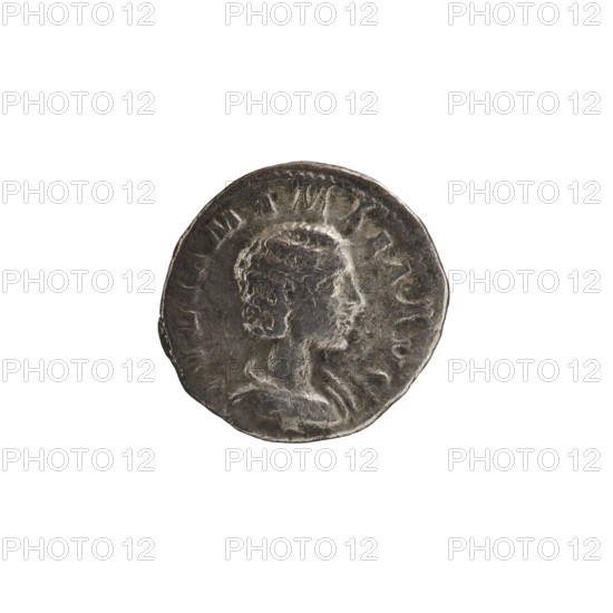 Denarius depicting Julia Mamaea ca. 180–235; Augusta 222–235 and Alexander Severus 208–235; Roman emperor 222–235. Obverse: portraits and inscriptions indicating rulers. Reverse: Juno Roman deity iconography. Date: 225–235 CE. Roman Empire; Rome mint. Coin; diameter ~17.0–19.0 mm; weight 1.69 g., A worn circular metal coin shown against a white background with a raised profile of a person's head in relief facing right; the coin surface is textured and uneven with areas of darker and lighter gray, and the rim appears slightly irregular.