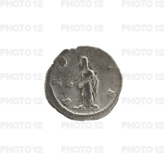 Denarius depicting Julia Mamaea ca. 180–235; Augusta 222–235 and Alexander Severus 208–235; Roman emperor 222–235, issuer Alexander Severus; obverse/persona: Julia Mamaea; reverse: Vesta Roman deity. Iconography attributed to Julia Mamaea 180–235. Date: 225–235, Rome. Roman Empire 27 BC–476. Coin; diameter 18.5–19.0 mm; weight 2.25 g., A worn circular metal coin with a dull gray color showing a raised depiction of a standing human figure in profile, facing slightly left, with one arm extended and the other holding an object; the coin surface has irregular edges and surface texture with areas of darker and lighter gray.