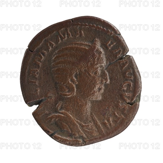 Sestertius featuring Julia Mamaea ca. 180–235 and Alexander Severus 208–235; Roman emperor 222–235; issuer/author: Alexander Severus; personification: Felicitas; iconography: Julia Mamaea 180–235; date: 225–235; place of creation: Rome, Roman Empire 27 BC–476; coin; diameters: 31.5 mm and 28.5 mm; weight: 20.45 g., A worn circular coin with a raised profile of a person's head facing right, showing textured hair and facial contours; the coin surface is uneven with several chips and cracks along the rim and edges. The visible colors are brown with darker brown and subtle reddish-brown variations, plus small areas of darker greenish patina. The background is plain white.