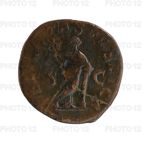 Sestertius, Julia Mamaea ca. 180–235; Augustus 222–235 and Alexander Severus 208–235; Roman emperor 222–235 issuer, personifications: Felicitas, Julia Mamaea 180–235 — iconography, dated 225–235, Roman Empire, Rome; coin; diameter 28.5–29.0 mm; weight 20.7 g., A round, worn metal coin with a dark brown and greenish patina showing a raised, weathered figure seated on a low platform; the figure appears to be holding an object and has a slightly lighter outline from the worn surface. The coin edge is irregular and darker along parts, with areas of lighter brown where the metal shows through, and there are faint worn impressions and shallow scratches across the surface. The overall colors visible are dark brown, lighter brown, greenish tones, and hints of gray where the relief is most worn.