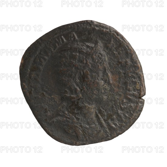 Sestertius, Julia Mamaea ca. 180–235; Augustus 222–235, issuer: Alexander Severus 208–235; Roman emperor 222–235; obverse: Julia Mamaea 180–235 — iconography; reverse: personification Felicitas. Date: 225–235. Place of creation: Rome, Roman Empire. Coin; diameter ~29.0–29.5 mm; weight 18.2 g., A round, worn metal coin with an uneven edge and a textured, pitted surface; the coin shows a faint raised profile of a person in the center and a slightly raised rim around the perimeter; colors visible include dark brown, black, rusty orange, and hints of greenish patina.