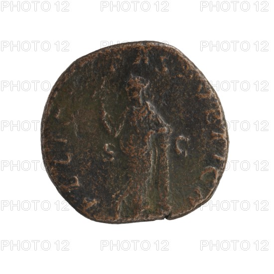 Sestertius featuring Julia Mamaea ca. 180–235 and Alexander Severus 208–235; Roman emperor 222–235. Obverse: portraits of Julia Mamaea; reverse: personification Felicitas. Dating: 225–235. Roman Empire; Rome. Coin sestertius. Diameter: 26.5–27.5 mm. Weight: 15.7 g., A round, worn coin with an uneven edge showing a raised profile of a standing figure in the center, surrounded by shallow indentations and decorative marks; the surface has a textured, pitted appearance with areas of smooth wear and small chips at the rim. The visible colors include dark brown, greenish-brown, and hints of lighter brown where the surface is more worn.