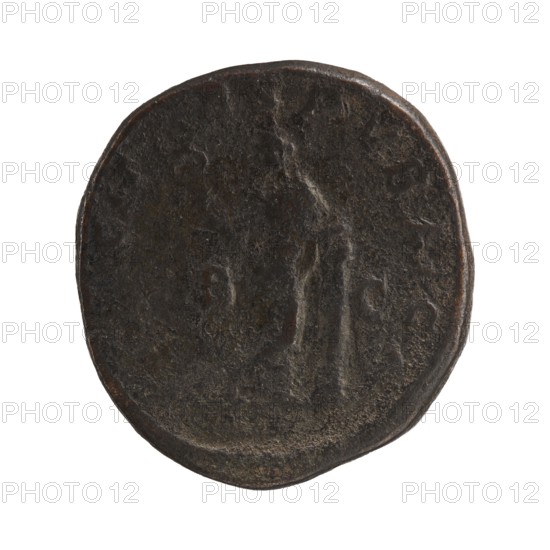 Sestertius depicting Julia Mamaea ca. 180–235 and Alexander Severus 208–235; Roman emperor 222–235, issuer Alexander Severus; obverse/personification imagery of Julia Mamaea; reverse: Felicitas personification. Date: 225–235. Roman Empire, Rome. Coin sestertius. Diameter: ca. 29–30 mm. Weight: 23.5 g., A roughly circular, worn coin with an uneven edge, shown against a white background; its surface is dark brown with areas of lighter brown and grayish highlights, showing a textured, pitted patina and faint raised shapes across the face.
