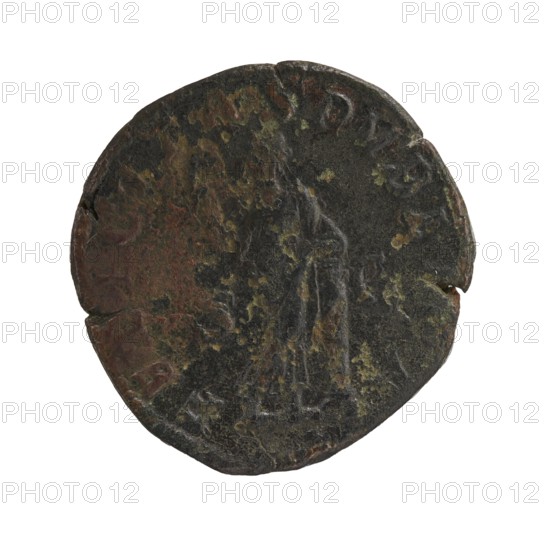 Sestertius of Julia Mamaea ca. 180–235 and Alexander Severus 208–235; Roman emperor 222–235, obverse/dedicated by Alexander Severus; reverse: Felicitas personification. Iconography: Julia Mamaea; personifications. Date: 225–235 CE. Place: Rome, Roman Empire. Object type: coin sestertius. Dimensions: diameter ca. 28.5–29.0 mm; weight 18.00 g., A round, worn coin with an uneven edge showing signs of corrosion and small chips, displaying a predominantly dark brown and black surface with patches of greenish and reddish-brown patina, and faint raised contours suggesting worn figures or shapes on its face.