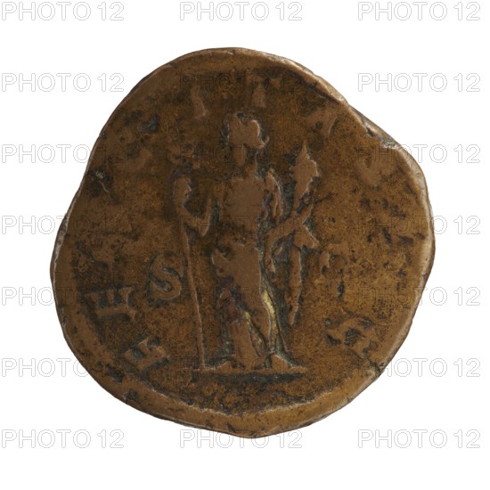 Sestertius featuring Julia Mamaea ca. 180–235 and Alexander Severus 208–235; Roman emperor 222–235. Obverse/issuer: Alexander Severus; portrait and titles. Reverse: Julia Mamaea—iconography with personification Fecunditas. Date: 222–235. Place: Rome, Roman Empire 27 BC–476. Coin sestertius; diameter approx. 30.0–31.5 mm; weight 23.87 g., A round, worn coin with an uneven edge showing a standing human figure in relief at the center, the figure holding a tall staff in one hand and a leafy branch in the other; the coin surface is mottled with areas of darker and lighter brown and small patches of greenish corrosion, and the background is plain white.