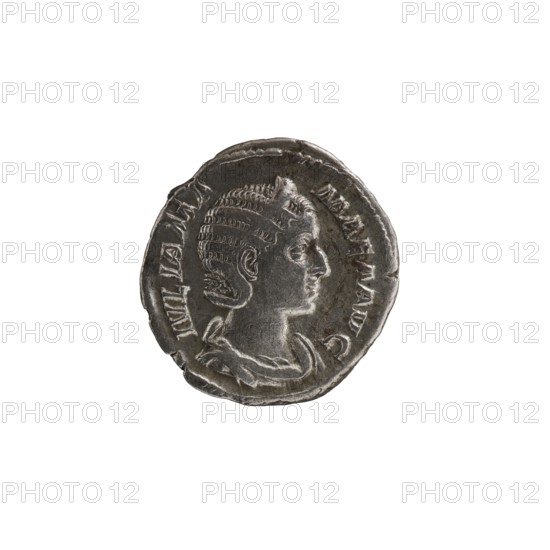 Denarius featuring Julia Mamaea ca. 180–235; Augusta 222–235 and Alexander Severus 208–235; Roman emperor 222–235. Obverse/inscriptions indicate imperial titles and issuer. Reverse depicts Felicitas personification and other personifications. Iconography dated 225–235, Roman Empire; minted in Rome. Coin; diameter 17.5–19.0 mm; weight 2.65 g., A round metallic coin with a worn, uneven edge showing a raised profile of a person facing right, with detailed hair arranged in horizontal rows and a draped garment at the neck; the coin surface shows varying textures and patina in shades of dark gray and silver against a white background.