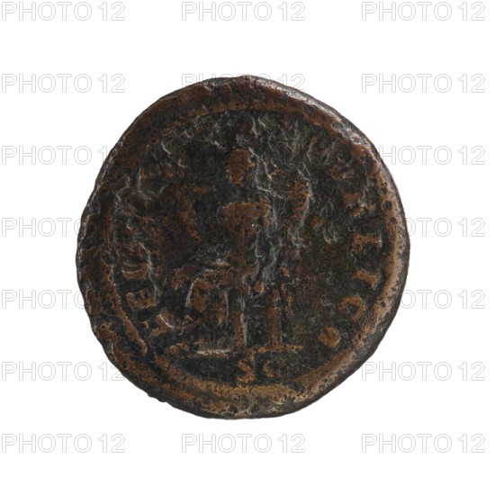 dupondius as?, Julia Mamaea ca. 180–235; Augusta 222–235 co-creator; Alexander Severus 208–235; Roman emperor 222–235 issuer; personifications—Felicitas; iconography of Julia Mamaea 180–235; date: 222–235; Roman Empire; place of creation: Rome; coin; diameter 27.0–28.0 mm; weight 14.05 g, A round, worn coin with a rough, pitted surface showing a mix of dark brown, black, and greenish patina; the edges are irregular and slightly raised, and the central area has faint, uneven raised shapes and contours suggesting eroded relief; the overall appearance is mottled with areas of lighter brown where the darker surface has been worn away.