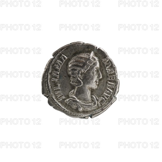 Denarius; obverse: Julia Mamaea ca. 180–235; Augusta 222–235, issuer Alexander Severus 208–235; Roman emperor 222–235; reverse: Fecunditas personification. Iconography: Julia Mamaea; personifications. Date: 225–235 CE. Place: Rome, Roman Empire. Material: coin. Diameter: 19.0–19.5 mm. Weight: 2.52 g., A round metallic coin centered on a white background showing a sculpted profile of a person facing right with detailed textured hair and a draped garment; the coin surface is worn with irregular edges and small chips, and the visible colors are silver-gray with darker gray patina and hints of bluish-green corrosion.