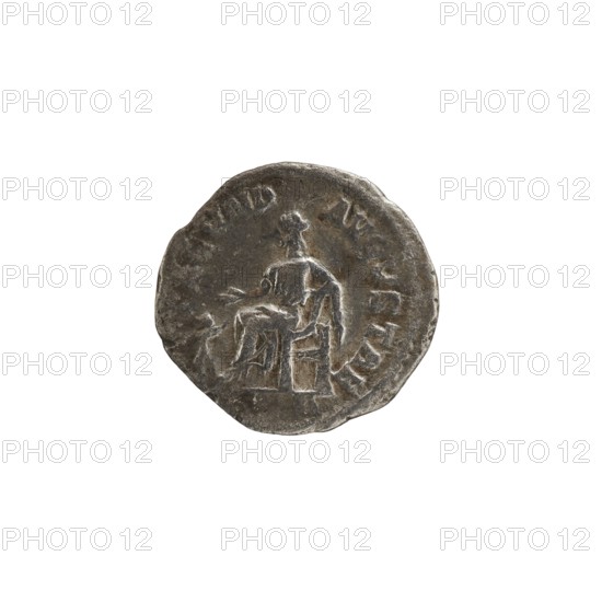 Denarius depicting Julia Mamaea ca. 180–235; Augusta 222–235 and Alexander Severus 208–235; Roman emperor 222–235. Obverse: busts/portraits of Julia Mamaea and Alexander Severus; inscriptions with titles and imperial mottos. Reverse: Fecunditas personification and other personifications. Iconography dated 225–235, Roman Empire; Rome mint. Coin; diameter 17.5–18.0 mm; weight 2.30 g., A round, worn metallic object with a dark gray and silver surface showing signs of age and patina; the object has an uneven edge and an embossed central figure of a seated person with simplified, stylized limbs and a visible chair or throne beneath them, with shallow relief lines suggesting folds of clothing and details around the seat; the overall color palette includes dark gray, silver, and touches of muted brownish tones.