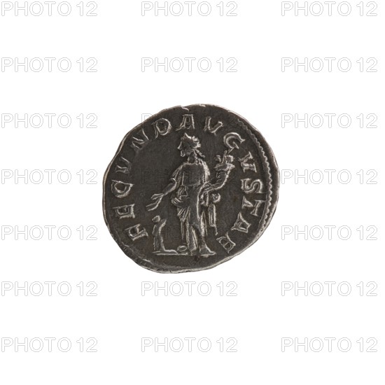 Denarius, Julia Mamaea ca. 180–235; Augusta 222–235 co-creator; Alexander Severus 208–235; Roman emperor 222–235 issuer; personifications; Julia Mamaea 180–235 — iconography; Fecunditas personification; 225–235 CE; Roman Empire; Rome; coin; diameter 17.0 mm; diameter 19.0 mm; weight 2.70 g, A round metallic coin with a dark gray and silver surface sits against a white background, showing wear and raised edges; the coin features a raised profile of a standing figure in draped clothing holding an object, with a few decorative raised elements and a border of raised markings around the rim.