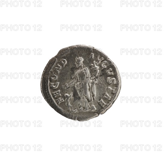 Denarius; obverse: Julia Mamaea ca. 180–235; Augusta 222–235 and Alexander Severus 208–235; Roman emperor 222–235 — issuer; reverse: Fecunditas personification. Iconography: Julia Mamaea 180–235. Date: 225–235. Place of creation: Rome, Roman Empire 27 BC–476. Medium: coin. Dimensions: diameter 18.5–19.5 mm; weight 3.07 g., A round metallic object with a worn, uneven edge, showing a relief image of a standing robed figure holding a tall torch-like item and gesturing with the other hand, with a small animal-like shape near the figure's feet; the surface shows scratches and areas of lighter and darker metallic gray tones against a plain white background.