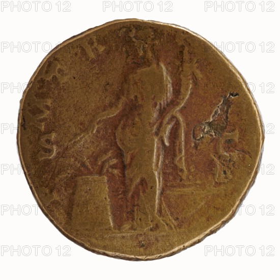 Sestertius, Antoninus Pius 86–161; Roman emperor 138–161. Obverse: bare head of Antoninus Pius to right; legend IMP T AEL CAES HADRI ANTONINVS AVG PIVS. Reverse: Annona standing left; in her right hand she holds two ears of corn above a modius with grain, in her left hand a cornucopia above the stern of a ship; legend P - MTR - POT COS II, in fields SC. Date: 139. Roman Empire, Rome. Bronze coin; diameter 30.5–31.0 mm, weight 24.05 g, axis 180°. Iconography: personifications, ears of corn, ships, modius, cornucopias; Annona standing with ears of corn held above a modius., A round, worn coin with a textured surface showing shades of brown, dark brown, and hints of greenish patina; the coin's rim is slightly irregular and lighter in color. The central area features a raised, partially eroded human figure standing and leaning forward, with contours suggesting an arm and a draped garment. To one side of the figure there is a raised vertical element that could be a staff or similar object. ...