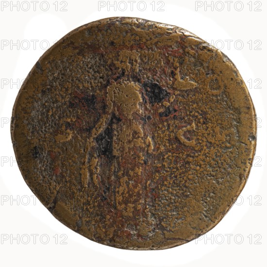 Sestertius, Antoninus Pius 86–161; Roman Emperor 138–161. Aw: head of Antoninus Pius in a laurel wreath facing right, inscribed ANTONINVS·AVG·PIVS·PP. Rw: Fides standing frontally, head facing right, holding a bowl of fruit in his outstretched left hand, ears of corn in his lowered right hand, inscribed TR POT - C OS II and in the fields SC. Date: 139. Iconography: ears of corn, fruit, personifications; Fides Fidelity standing. Place of origin: Rome, Roman Empire. Object type: coin sestertius. Dimensions: diameter 31.5–34.0 mm, weight 22.37 g, axis 195°., A round, worn metallic object with an irregular edge showing a textured surface in shades of brown, golden, dark gray, black, and touches of red, with areas of smoother shine and patches of rougher, pitted corrosion suggesting uneven wear across the surface.