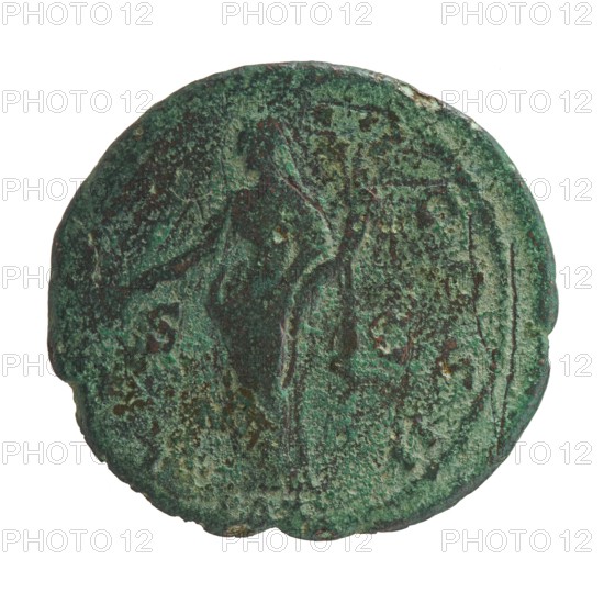 Antoninus Pius 86–161; Roman Emperor 138–161. Obverse: Head of Antoninus Pius in a laurel wreath facing right, legend ANTONINVS • AVG PIVS PP. Reverse: Pax standing left, holding a twig in his right hand and a cornucopia in his left, legend TR POT COS II in the PAX section and SC in the fields, dated 139. Roman, mint: Rome. Bronze coin; diameter 26.5–28.0 mm, weight 8.28 g, axis 180°., A circular, weathered object with a rough, pitted surface showing mottled shades of green and dark brown, with a faint, worn raised outline of a standing human figure in the center and subtle curved lines near the edge; the object has an irregular rim and small chips around its perimeter.