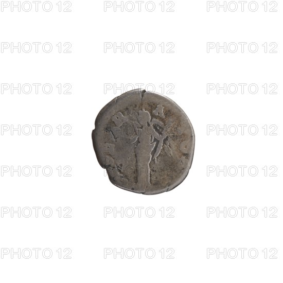 Denarius, Antoninus Pius 86–161; Roman emperor 138–161. Obverse: head of Antoninus Pius in a laurel wreath facing right; legend ANTONINVSAVG PI-VS PP TR P COS III. Reverse: Victoria standing left, holding a wreath in her right hand and a palm branch in her left; legend IMPE R-A TOR II. Date: 143–144. Place of origin: Rome, Roman Empire. Type: coin denarius. Diameter: 17.0 mm. Weight: 3.04 g. Axis: 180°., A round, worn coin with an uneven edge shown against a white background, exhibiting a metallic gray surface with areas of darker gray and brownish discoloration; the coin's face shows shallow, irregular raised marks and faint, eroded impressions suggesting indistinct shapes and contours across its surface.