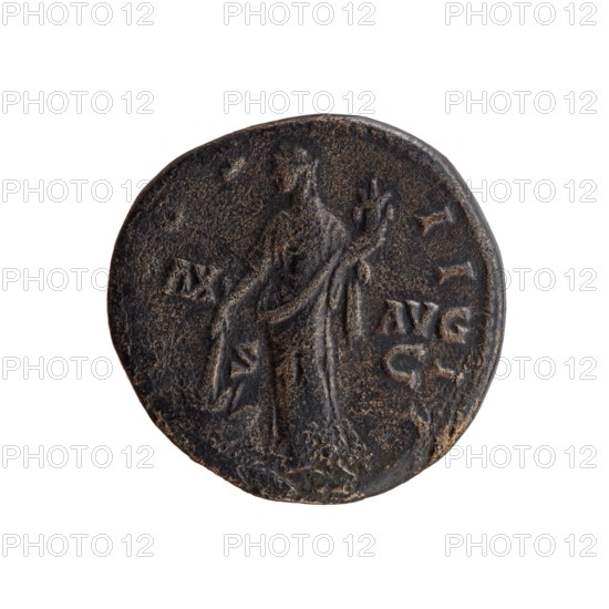 Sestertius of Antoninus Pius 86–161; Roman emperor 138–161. Obverse: head of Antoninus Pius in a laurel wreath facing right; legend ANTONINVS - AVG PIVS P P TR P. Reverse: Pax standing left, holding a horn of plenty in his left hand and in his lowered right hand a torch with which he ignites a weapon; legend COS - II - II and in the fields PAX - AVG / S - C. Date c. 145–161, Roman Empire; Rome mint. Bronze coin, diameter 30.5–31.0 mm, weight 24.00 g, axis 345°., A round, worn coin with a dark brown and black patina showing a raised, weathered figure in flowing drapery standing in the center, with a raised hand gesture and an arm extended; the surface shows rough texture and lighter brown highlights on raised areas and edges, and the coin edge is irregular and slightly chipped.